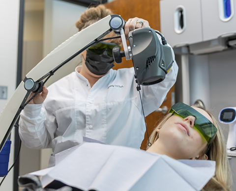 Dental patient having photos taken of their mouth and jaw