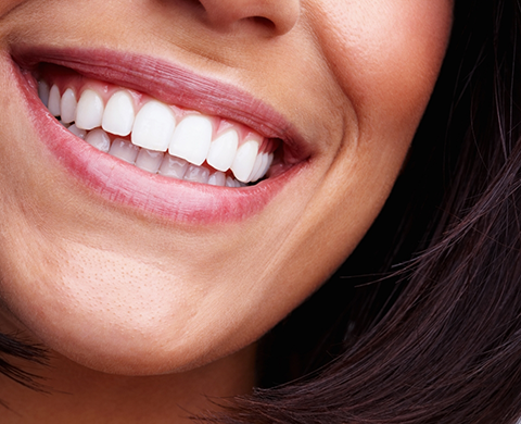 Close up of woman smiling with white teeth