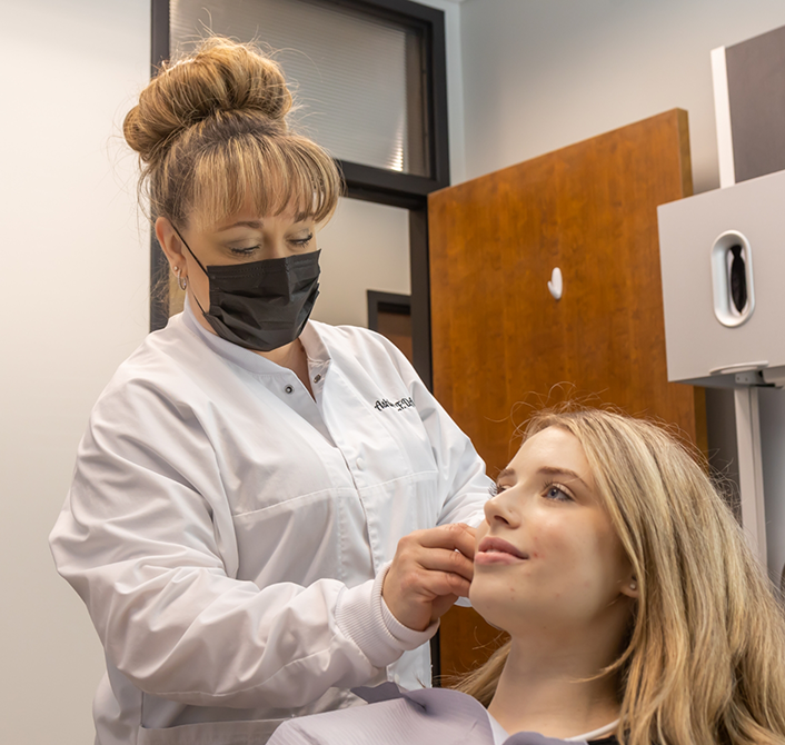 Eugene dental team member treating a patient